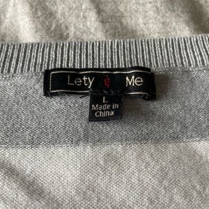 Grey & White striped sweater with button details